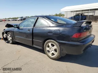 1999 Acura Integra LS with VIN JH4DC4450XS011986, listed as a Copart auction lot 72656914 with 197,567 mi miles and Salvage Title. Bid and sale history available at carsss.com. Image 2.