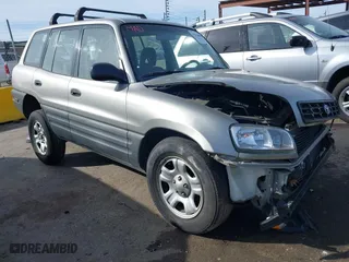 1999 Toyota RAV4 with VIN JT3HP10V7X0210027, listed as a IAAI auction lot 41528090 with 134,983 mi miles. Bid and sale history available at carsss.com. Image 1.