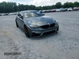 2018 BMW M4 with VIN WBS4Z9C50JED22222, listed as a Copart auction lot 57043595 with 71,899 mi miles and Salvage title. Bid and sale history available at DreamBid. Image 13.