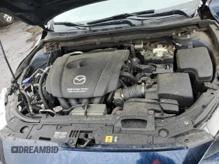 2014 Mazda 3 i Touring z VIN 3MZBM1V75EM114151, wystawiony jako Copart lot #57565985 z przebiegiem 113 102 mil mil oraz Szkoda całkowita • Salvage title. Historia ofert i sprzedaży dostępna na DreamBid. Obrazek 11.