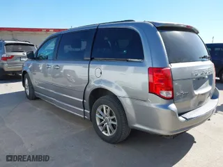 2014 Dodge Grand Caravan SXT 30th Anniversary with VIN 2C4RDGCGXER252719, listed as a IAAI auction lot 41870640 with 191,784 mi miles. Bid and sale history available at carsss.com. Image 3.