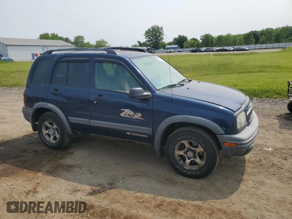 2004 Chevrolet Tracker ZR2 z VIN 2CNBJ734346903751, wystawiony jako Copart lot #59300765 z przebiegiem 126 924 mil mil oraz Szkoda całkowita • Salvage title. Historia ofert i sprzedaży dostępna na DreamBid. Obrazek 4.