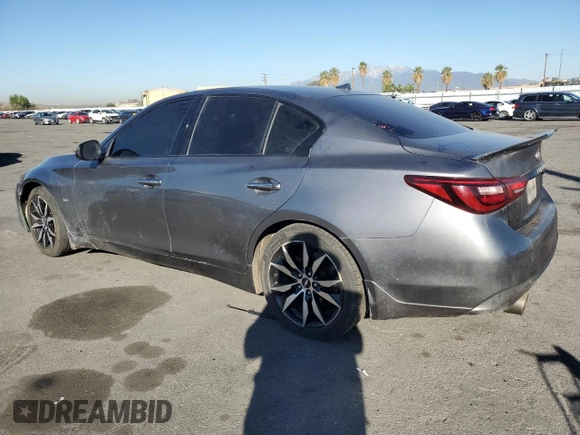 2019 Infiniti Q50 Luxe with VIN JN1EV7AP8KM514379, listed as a Copart auction lot 46948985 with 103,756 mi miles and Salvage title. Bid and sale history available at DreamBid. Image 2.