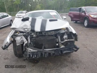 2019 Dodge Challenger SXT z VIN 2C3CDZAG9KH744703, wystawiony jako IAAI lot #41881944 z przebiegiem Nie podano mil oraz . Historia ofert i sprzedaży dostępna na DreamBid. Obrazek 13.