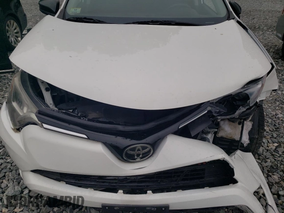 2018 Toyota RAV4 LE with VIN 2T3BFREV3JW764258, listed as a Copart auction lot 61234155 with Not provided miles and Salvage title. Bid and sale history available at DreamBid. Image 12.
