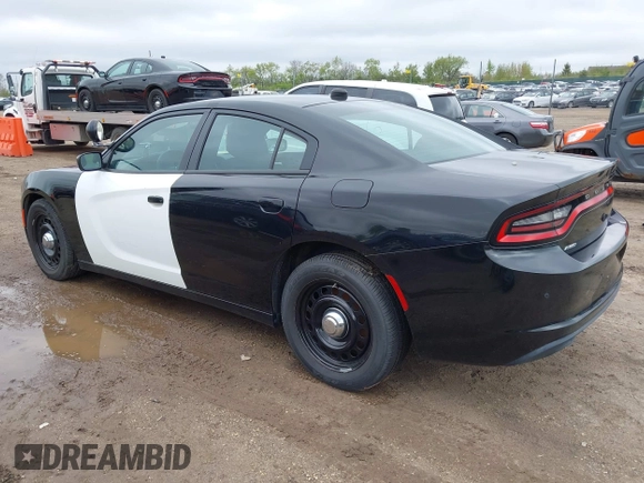2018 Dodge Charger Police with VIN 2C3CDXKT4JH323762, listed as a IAAI auction lot 42184867 with 107,575 mi miles and . Bid and sale history available at carsss.com. Image 3.