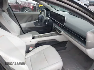 2023 Hyundai IONIQ 6 SEL with VIN KMHM34AA6PA030658, listed as a IAAI auction lot 41271375 with 19,544 mi miles. Bid and sale history available at carsss.com. Image 5.