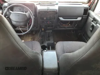 2002 Jeep Wrangler X with VIN 1J4FA39SX2P732881, listed as a Copart auction lot 64451185 with Not provided miles and Clean title. Bid and sale history available at DreamBid. Image 8.