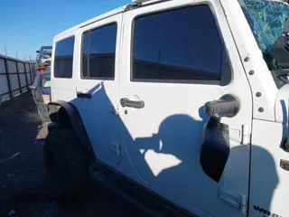 2016 Jeep Wrangler Unlimited Sahara with VIN 1C4BJWEG5GL243004, listed as a IAAI auction lot 40438321 with 121,360 mi miles and . Bid and sale history available at DreamBid. Image 13.