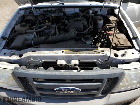 2011 Ford Ranger XL z VIN 1FTKR1AD8BPA54386, wystawiony jako Copart lot #58412835 z przebiegiem 85 137 mil mil oraz Szkoda całkowita • Salvage title. Historia ofert i sprzedaży dostępna na DreamBid. Obrazek 11.