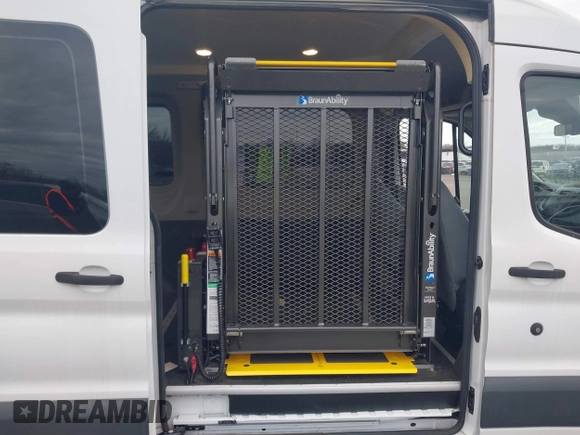 2016 Ford Transit Cargo with VIN 1FTYR1CM5GKA27058, listed as a IAAI auction lot 41753527 with 112,824 mi miles and . Bid and sale history available at DreamBid. Image 18.