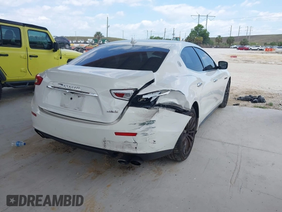 2016 Maserati Ghibli S with VIN ZAM57RSA3G1171238, listed as a IAAI auction lot 42290180 with 117,738 mi miles and . Bid and sale history available at DreamBid. Image 4.