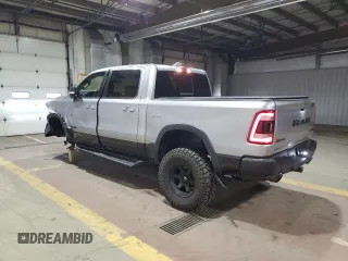 2022 Ram 1500 Rebel z VIN 1C6SRFLT1NN258780, wystawiony jako Copart lot #53040405 z przebiegiem 27 307 mil mil oraz Szkoda całkowita • Salvage title. Historia ofert i sprzedaży dostępna na DreamBid. Obrazek 2.