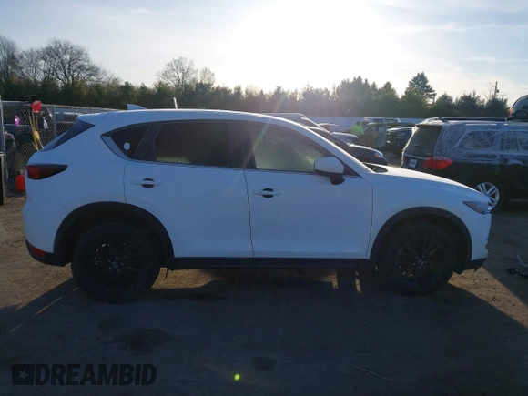 2017 Mazda CX-5 Touring with VIN JM3KFBCL8H0136601, listed as a IAAI auction lot 41830355 with 113,677 mi miles. Bid and sale history available at carsss.com. Image 14.