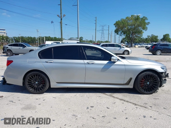 2016 BMW 7 Series 750i xDrive with VIN WBA7F2C52GG417733, listed as a IAAI auction lot 42040625 with 91,007 mi miles. Bid and sale history available at carsss.com. Image 14.
