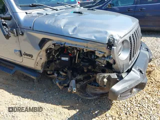2021 Jeep Gladiator Willys z VIN 1C6HJTAG6ML507039, wystawiony jako IAAI lot #42057637 z przebiegiem 69 443 mil mil oraz . Historia ofert i sprzedaży dostępna na DreamBid. Obrazek 6.