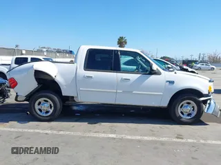 2003 Ford F-150 XLT with VIN 1FTRW07653KC82984, listed as a IAAI auction lot 42282305 with 933,470 mi miles and . Bid and sale history available at DreamBid. Image 13.