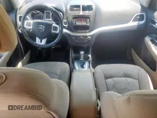 2012 Dodge Journey SXT with VIN 3C4PDCBG1CT134375, listed as a Copart auction lot 61059305 with 165,913 mi miles and Salvage title. Bid and sale history available at DreamBid. Image 8.