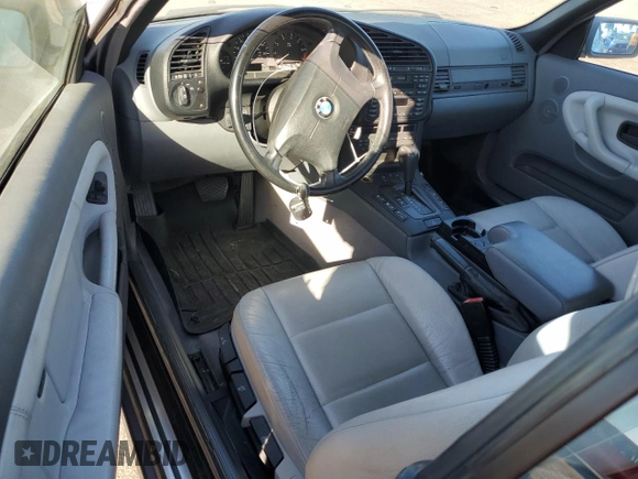 1999 BMW 3 Series 323icA with VIN WBABJ8332XEM24560, listed as a Copart auction lot 80756544 with 63,056 mi miles and Salvage Title. Bid and sale history available at carsss.com. Image 8.