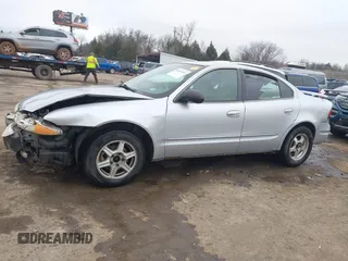 2003 Oldsmobile Alero GL1 z VIN 1G3NL52F43C169291, wystawiony jako IAAI lot #41546681 z przebiegiem 176 341 mil mil oraz . Historia ofert i sprzedaży dostępna na DreamBid. Obrazek 15.