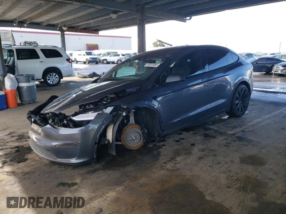2023 Tesla Model X with VIN 7SAXCDE55PF410146, listed as a Copart auction lot 48818085 with 26,494 mi miles and Salvage Title. Bid and sale history available at DreamBid. Image 1.