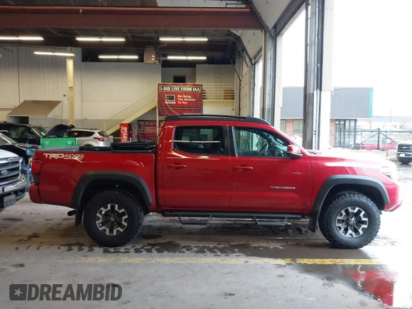 2019 Toyota Tacoma SR z VIN 3TMCZ5AN5KM220079, wystawiony jako IAAI lot #41856695 z przebiegiem 51 918 mil mil oraz . Historia ofert i sprzedaży dostępna na DreamBid. Obrazek 13.