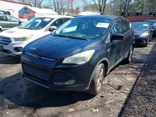2014 Ford Escape SE with VIN 1FMCU0GXXEUE45586, listed as a IAAI auction lot 41813850 with 179,701 mi miles. Bid and sale history available at carsss.com. Image 2.