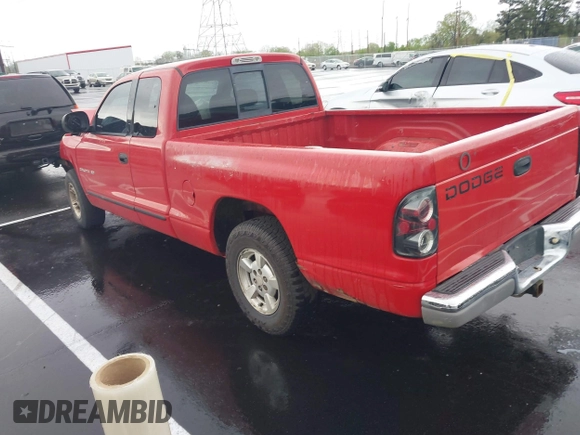 1999 Dodge Dakota SLT z VIN 1B7GL22X3XS155894, wystawiony jako IAAI lot #41938830 z przebiegiem 224 068 mil mil oraz . Historia ofert i sprzedaży dostępna na DreamBid. Obrazek 3.