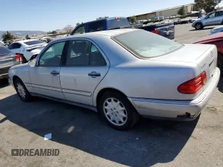 1999 Mercedes-Benz E-Class with VIN WDBJF65H3XA882627, listed as a Copart auction lot 72476674 with 187,656 mi miles and Salvage Title. Bid and sale history available at carsss.com. Image 2.