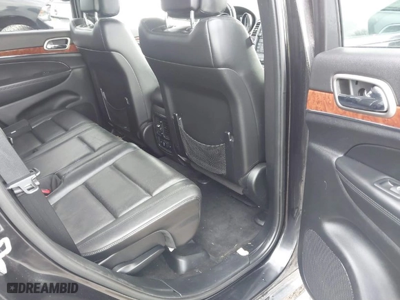 2013 Jeep Grand Cherokee Limited with VIN 1C4RJFBT9DC592257, listed as a IAAI auction lot 40955180 with 130,038 mi miles. Bid and sale history available at carsss.com. Image 8.