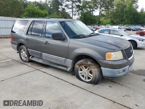 2004 Ford Expedition Special Service with VIN 1FMFU16L54LA95354, listed as a Copart auction lot 57027115 with 176,243 mi miles and Salvage title. Bid and sale history available at DreamBid. Image 4.