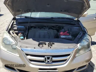 2005 Honda Odyssey EX-L with VIN 5FNRL38625B045152, listed as a Copart auction lot 57633005 with 145,776 mi miles and Salvage title. Bid and sale history available at DreamBid. Image 12.