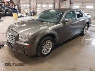 2010 Chrysler 300 Touring with VIN 2C3CA5CV9AH101800, listed as a IAAI auction lot 42015640 with 128,457 mi miles and . Bid and sale history available at DreamBid. Image 2.