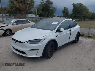 2022 Tesla Model X with VIN 7SAXCBE56NF364067, listed as a IAAI auction lot 40947378 with Not Provided miles and . Bid and sale history available at DreamBid. Image 2.