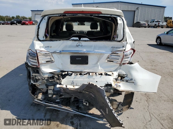 2016 Mercedes-Benz GL with VIN 4JGDF6EE5GA698435, listed as a Copart auction lot 73156434 with 137,302 mi miles and Salvage Title. Bid and sale history available at carsss.com. Image 6.