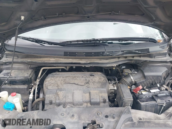 2016 Honda Odyssey Touring Elite with VIN 5FNRL5H97GB010048, listed as a IAAI auction lot 40212711 with 119,009 mi miles and . Bid and sale history available at DreamBid. Image 10.