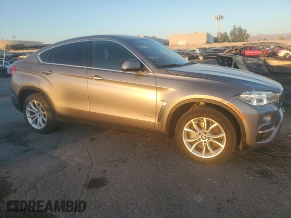 2016 BMW X6 xDrive50i with VIN 5UXKU6C53G0R99908, listed as a Copart auction lot 75877754 with 112,289 mi miles and Clean Title. Bid and sale history available at carsss.com. Image 4.