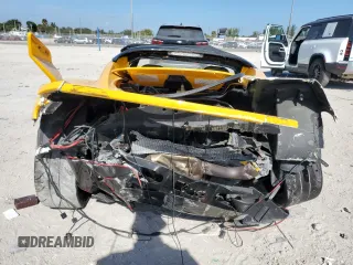 2005 Lotus Elise z VIN SCCPC11105HL30103, wystawiony jako Copart lot #87713445 z przebiegiem Nie podano mil oraz Szkody całkowita. Historia ofert i sprzedaży dostępna na DreamBid. Obrazek 6.
