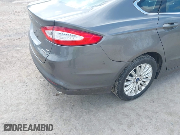 2014 Ford Fusion SE Hybrid with VIN 3FA6P0LU3ER152517, listed as a IAAI auction lot 42801042 with 209,898 mi miles and . Bid and sale history available at DreamBid. Image 6.