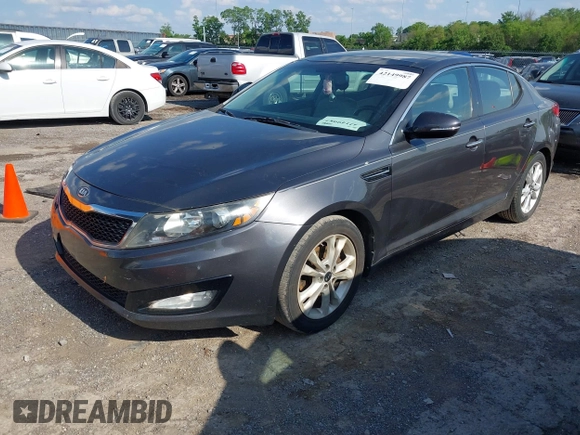 2011 Kia Optima EX with VIN KNAGN4A7XB5060289, listed as a IAAI auction lot 42149987 with 174,243 mi miles and . Bid and sale history available at carsss.com. Image 2.