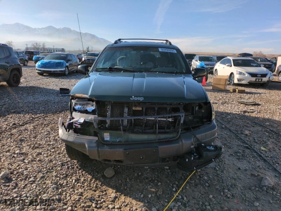 2001 Jeep Grand Cherokee Laredo with VIN 1J4GW48N21C570404, listed as a Copart auction lot 85996954 with 153,838 mi miles and Salvage Title. Bid and sale history available at carsss.com. Image 5.