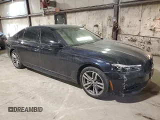 2017 BMW 7 Series with VIN WBA7F2C34HG423291, listed as a Copart auction lot 42914665 with 61,113 mi miles and Salvage Title. Bid and sale history available at DreamBid. Image 4.