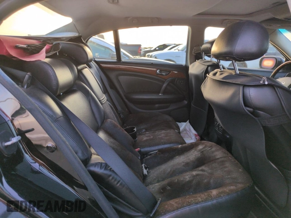 2003 Infiniti Q45 z VIN JNKBF01A73M102745, wystawiony jako Copart lot #75193194 z przebiegiem Nie podano mil oraz Nie do naprawy. Historia ofert i sprzedaży dostępna na DreamBid. Obrazek 10.