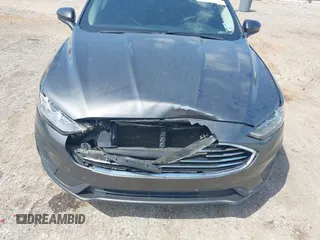 2020 Ford Fusion SE z VIN 3FA6P0H79LR118534, wystawiony jako IAAI lot #42065215 z przebiegiem 104 202 mil mil oraz . Historia ofert i sprzedaży dostępna na DreamBid. Obrazek 6.