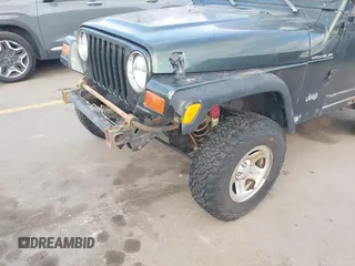 1998 Jeep Wrangler SE with VIN 1J4FY29P1WP760687, listed as a IAAI auction lot 41720889 with 210,592 mi miles. Bid and sale history available at carsss.com. Image 12.