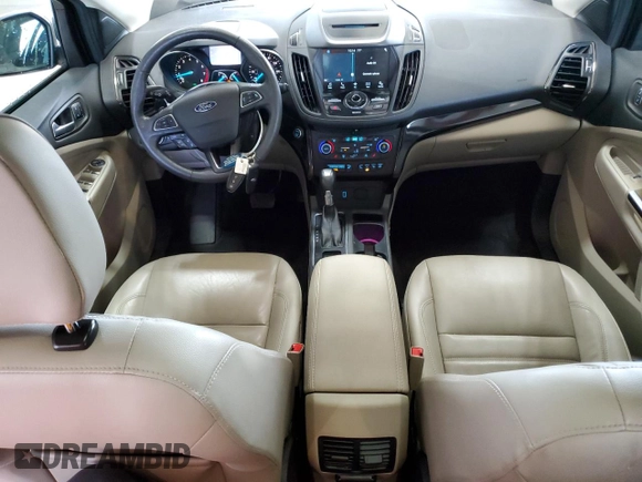 2018 Ford Escape Titanium с VIN 1FMCU9J90JUB30658, выставлен на аукционе Copart как лот 64001665 с пробегом 61 970 миль миль и Списание • Salvage title. История ставок и продаж доступна на DreamBid. Изображение 8.