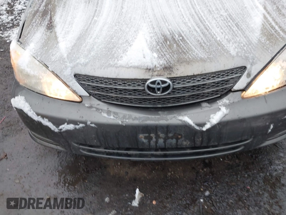 2004 Toyota Camry LE z VIN 4T1BE32K64U896809, wystawiony jako IAAI lot #41075176 z przebiegiem 223 763 mil mil oraz . Historia ofert i sprzedaży dostępna na DreamBid. Obrazek 6.