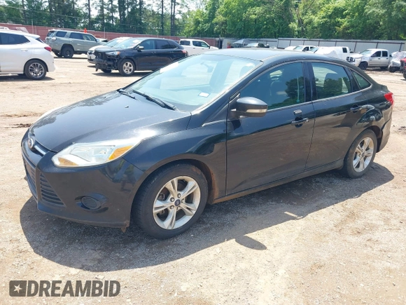 2014 Ford Focus SE with VIN 1FADP3F24EL431332, listed as a IAAI auction lot 42135538 with 121,362 mi miles. Bid and sale history available at carsss.com. Image 2.
