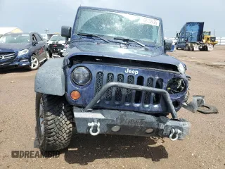 2013 Jeep Wrangler Unlimited Rubicon with VIN 1C4BJWFG5DL572795, listed as a Copart auction lot 62132425 with 149,695 mi miles and Salvage title. Bid and sale history available at DreamBid. Image 5.