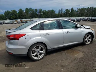 2015 Ford Focus Titanium with VIN 1FADP3J27FL285842, listed as a Copart auction lot 61159935 with 79,215 mi miles and Salvage title. Bid and sale history available at DreamBid. Image 3.